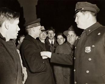 WEEGEE [ARTHUR FELLIG] (1899-1968) A pair of photographs, one showing a policeman in a crowd, the other a group of Navymen.